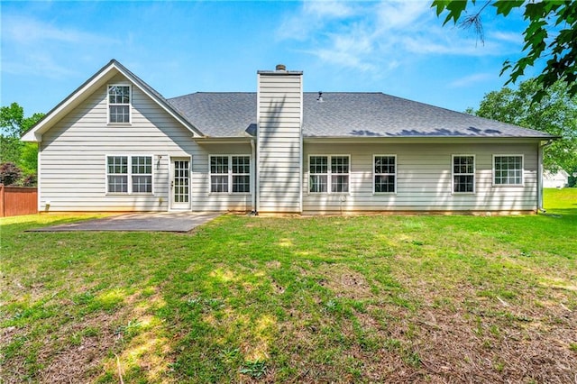 85 Old Gettysburg Way, Dallas, GA 30157 - back of property with a patio, a chimney, and a shingled roof