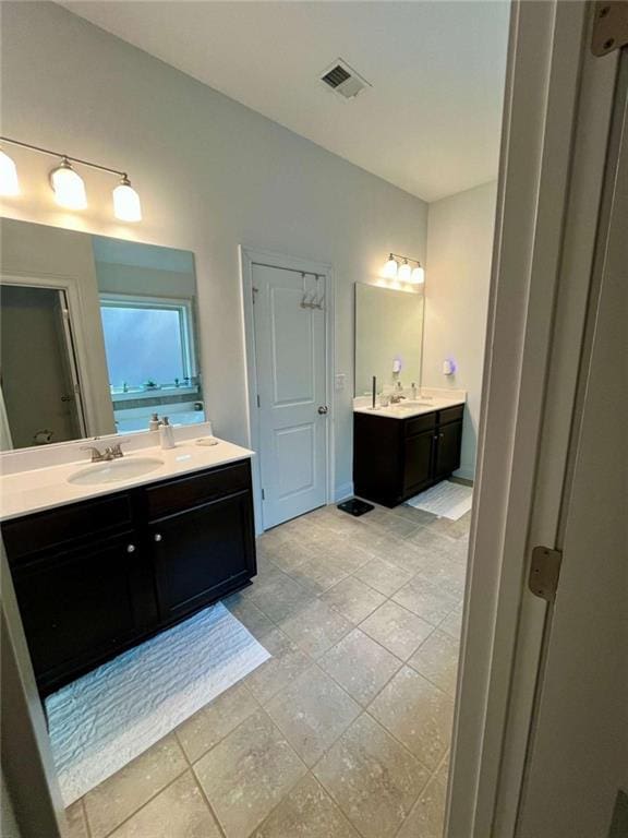 2208 Ginger Lake Dr NE, Conyers, GA 30013 - bathroom with two vanities