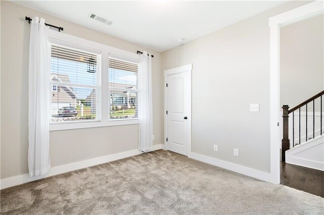 view of carpeted spare room