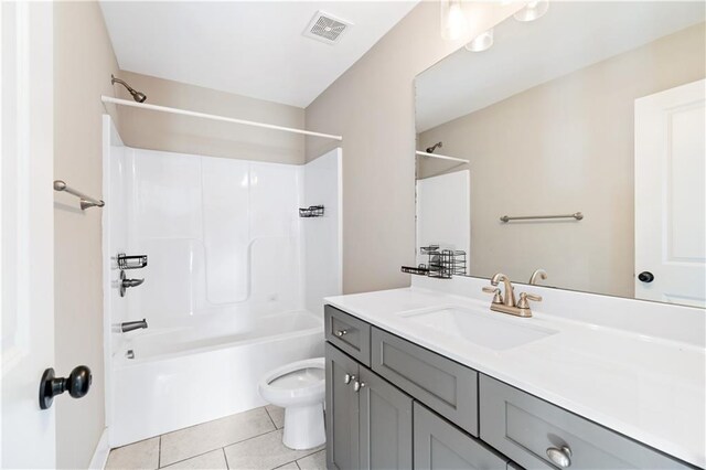 full bathroom featuring tile patterned floors, vanity,  shower combination, and toilet