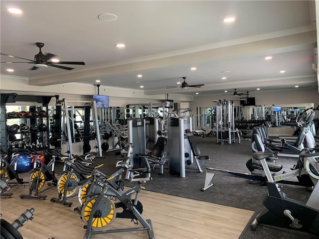 workout area with hardwood / wood-style floors and ceiling fan