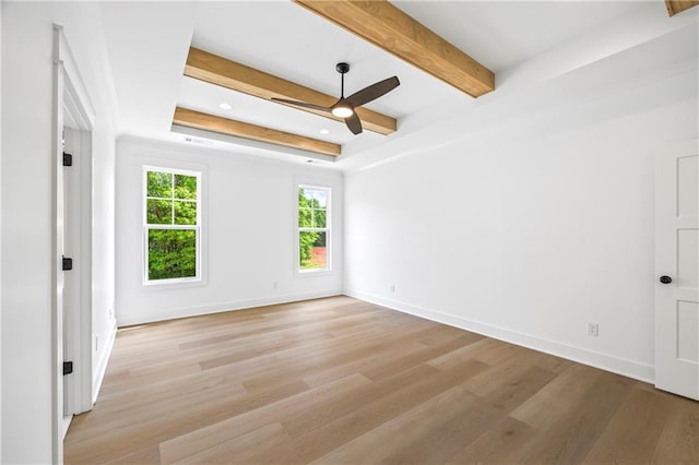 3601 Perry Smith Rd, Monroe, GA 30656 - empty room featuring light wood-type flooring, baseboards, ceiling fan, and beam ceiling