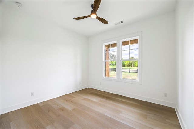 3601 Perry Smith Rd, Monroe, GA 30656 - spare room with visible vents, light wood-style flooring, and baseboards