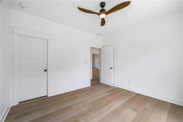 3601 Perry Smith Rd, Monroe, GA 30656 - unfurnished bedroom featuring baseboards, ceiling fan, and light wood-style flooring