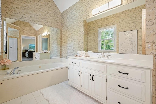 921 Laurel Crest Dr, Woodstock, GA 30189 - full bathroom with lofted ceiling, a bath, vanity, tile patterned flooring, and an enclosed shower