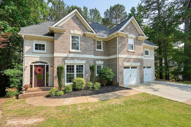 921 Laurel Crest Dr, Woodstock, GA 30189 - view of front of house featuring concrete driveway, an attached garage, a front yard, and brick siding