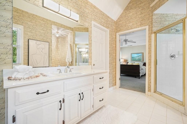 921 Laurel Crest Dr, Woodstock, GA 30189 - ensuite bathroom featuring a shower stall, lofted ceiling, tile patterned floors, vanity, and a ceiling fan