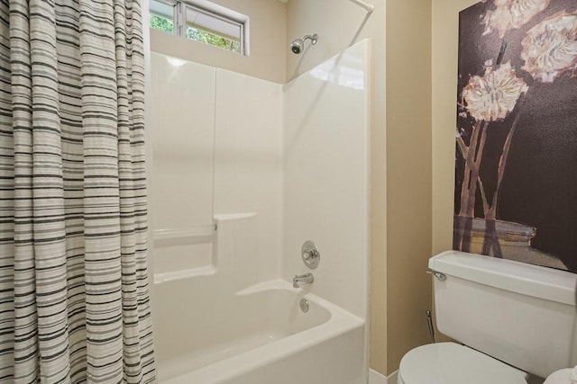 921 Laurel Crest Dr, Woodstock, GA 30189 - bathroom featuring shower / bath combo with shower curtain and toilet