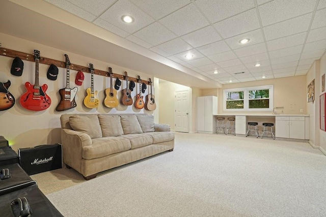 921 Laurel Crest Dr, Woodstock, GA 30189 - living room featuring light colored carpet, recessed lighting, and a paneled ceiling