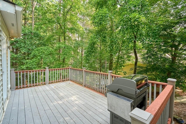921 Laurel Crest Dr, Woodstock, GA 30189 - wooden terrace with area for grilling