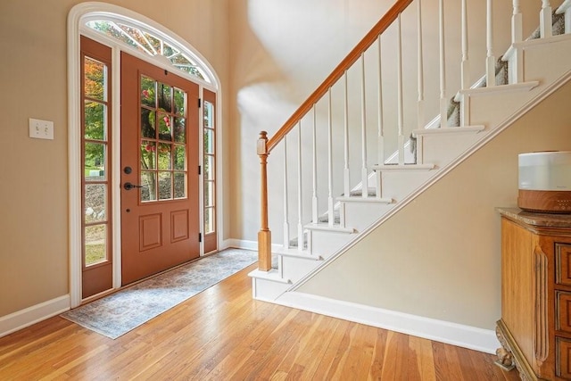 921 Laurel Crest Dr, Woodstock, GA 30189 - foyer with baseboards and wood finished floors