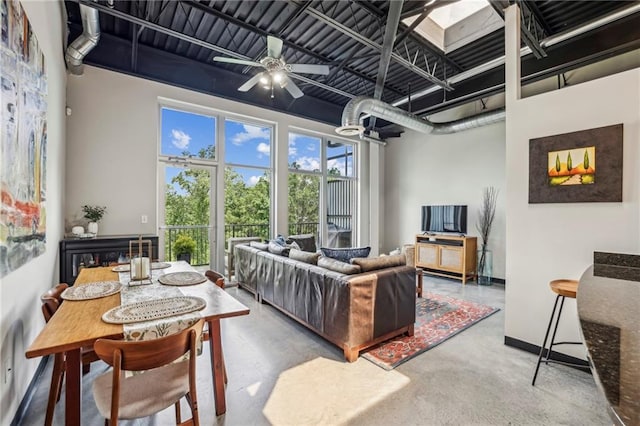 5200 Peachtree Rd Unit 3420, Atlanta, GA 30341 - living room featuring concrete flooring and ceiling fan
