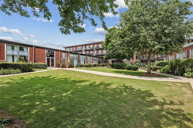 5200 Peachtree Rd Unit 3420, Atlanta, GA 30341 - view of property's community with a yard