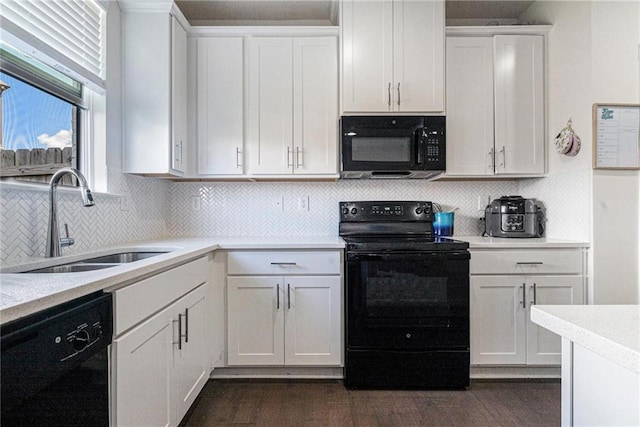 160 Auburn Gate Ln, Auburn, GA 30011 - kitchen with black appliances, light countertops, white cabinetry, and backsplash