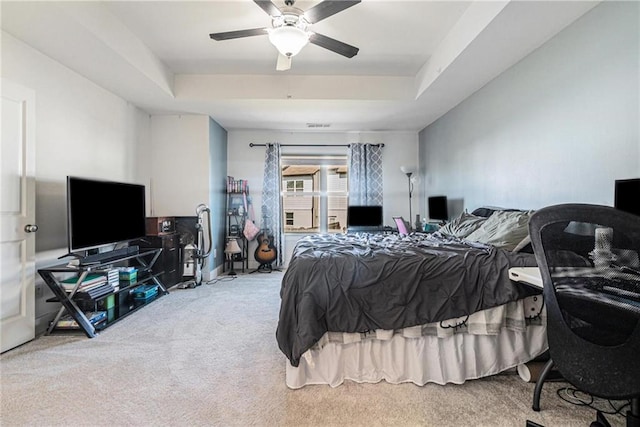 160 Auburn Gate Ln, Auburn, GA 30011 - bedroom featuring carpet, a raised ceiling, and a ceiling fan