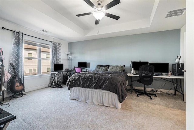 160 Auburn Gate Ln, Auburn, GA 30011 - carpeted bedroom with an office area, a raised ceiling, and a ceiling fan