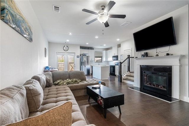 160 Auburn Gate Ln, Auburn, GA 30011 - living area with ceiling fan, dark wood-style floors, recessed lighting, and a glass covered fireplace