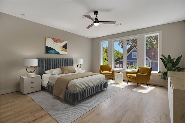 454 Connally St SE, Atlanta, GA 30312 - bedroom with multiple windows, light wood finished floors, and ceiling fan