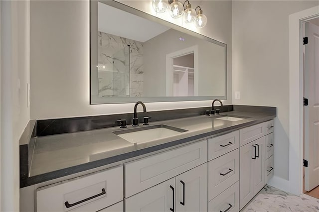 454 Connally St SE, Atlanta, GA 30312 - bathroom with marble finish flooring, double vanity, and a marble finish shower