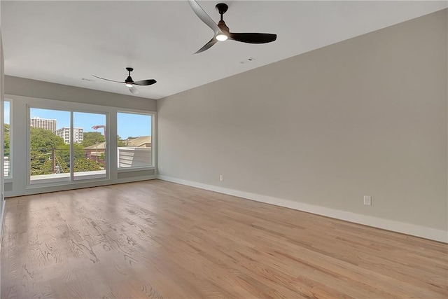 454 Connally St SE, Atlanta, GA 30312 - empty room featuring a ceiling fan and light wood finished floors