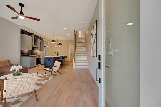454 Connally St SE, Atlanta, GA 30312 - foyer with light wood finished floors, ceiling fan, stairs, and recessed lighting