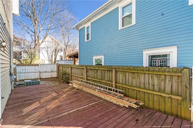 wooden terrace featuring cooling unit