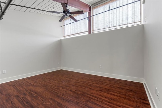 spare room featuring hardwood / wood-style floors and ceiling fan