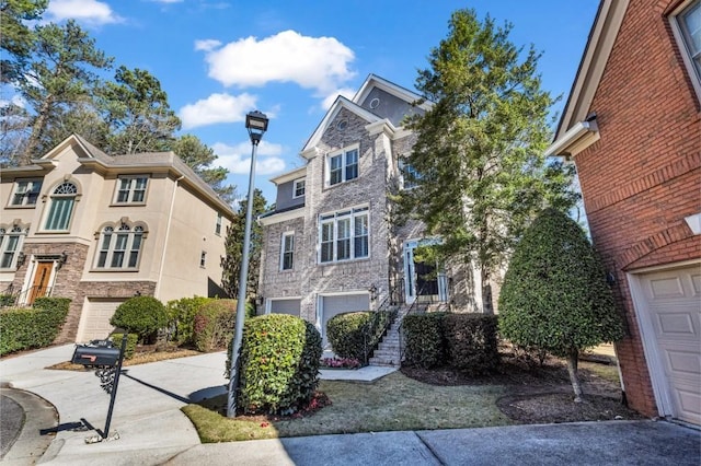 view of front of property with driveway and an attached garage