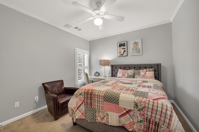 bedroom with visible vents, crown molding, light carpet, and baseboards