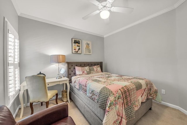 bedroom with a ceiling fan, baseboards, ornamental molding, and carpet flooring