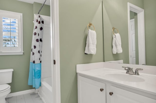 full bathroom featuring tile patterned flooring, toilet, vanity, baseboards, and shower / bath combo with shower curtain