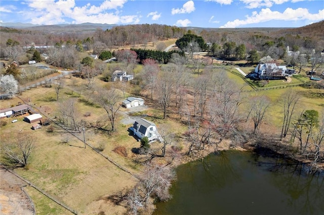 bird's eye view featuring a mountain view and a rural view