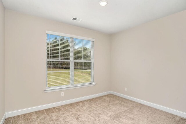 201 Cooper Dr, Mansfield, GA 30055 - carpeted empty room featuring baseboards
