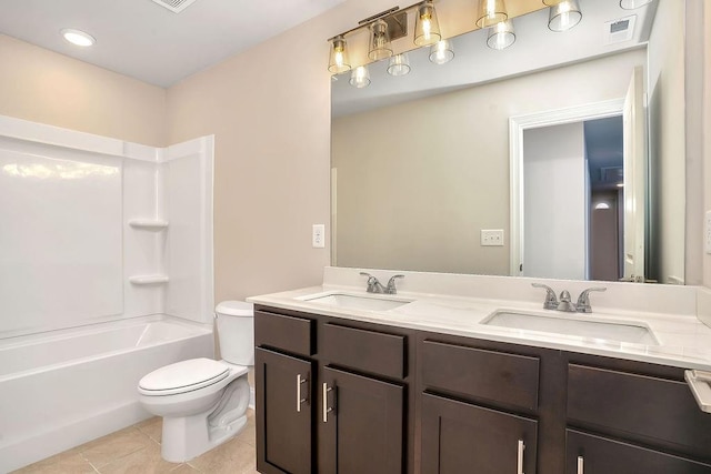 full bathroom with tile patterned floors, vanity, toilet, and shower / tub combination