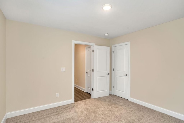 unfurnished bedroom featuring carpet floors