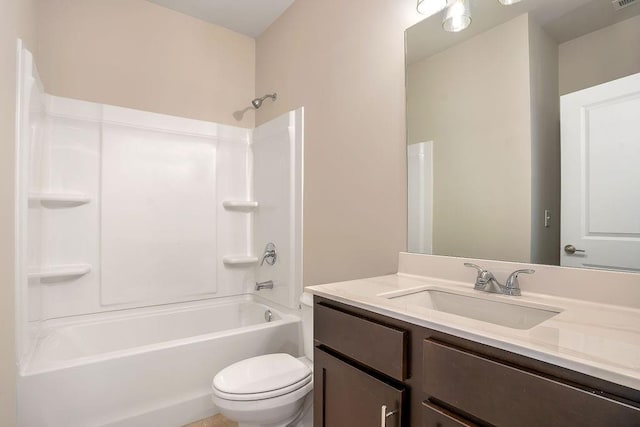 full bathroom featuring bathing tub / shower combination, vanity, and toilet