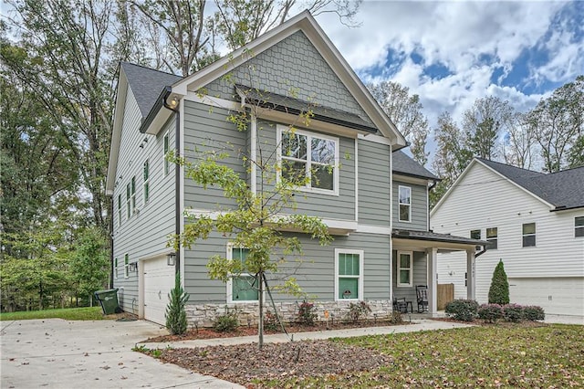 craftsman inspired home featuring a garage