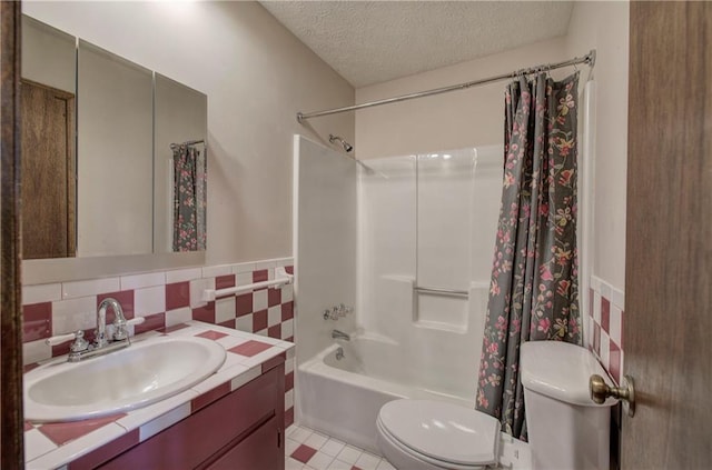 bathroom with a textured ceiling, toilet, vanity, decorative backsplash, and shower / bathtub combination with curtain