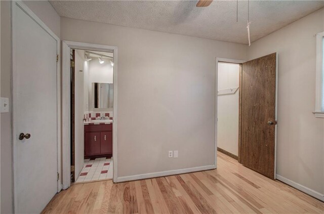 bathroom featuring washtub / shower combination and vanity