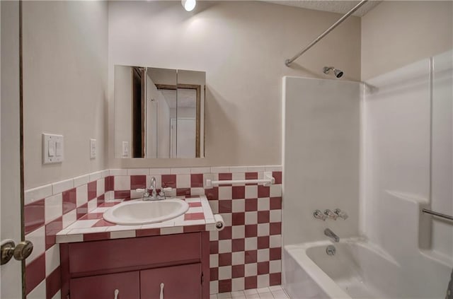 bathroom with  shower combination and vanity