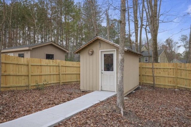 view of shed featuring a fenced backyard