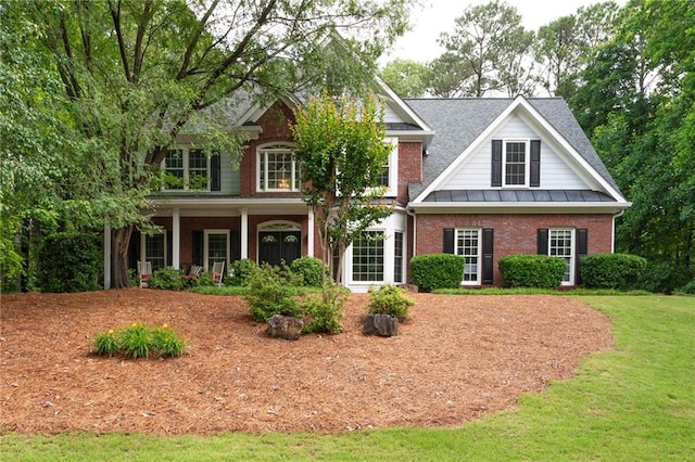 206 Kingsley Way, Woodstock, GA 30188 - view of front of house with a porch, brick siding, and a front lawn