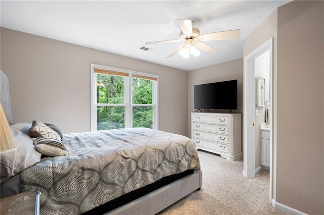 206 Kingsley Way, Woodstock, GA 30188 - bedroom with light colored carpet, baseboards, and ceiling fan