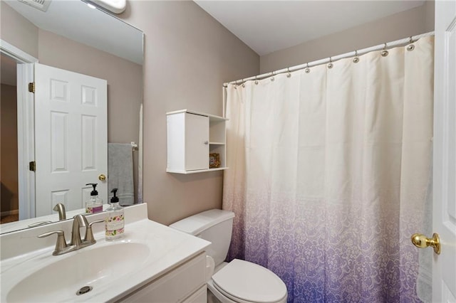 206 Kingsley Way, Woodstock, GA 30188 - bathroom featuring toilet, vanity, and a shower with shower curtain