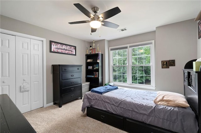 206 Kingsley Way, Woodstock, GA 30188 - bedroom featuring a closet, light carpet, a ceiling fan, and baseboards
