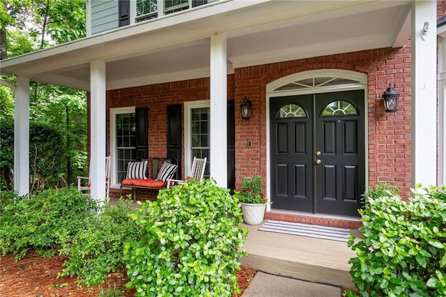 206 Kingsley Way, Woodstock, GA 30188 - view of exterior entry with brick siding and covered porch
