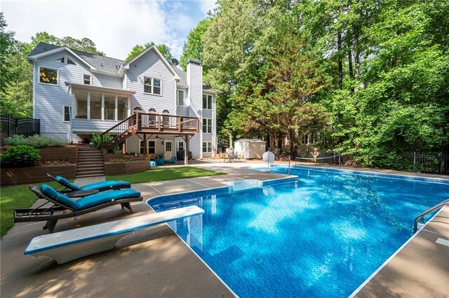 206 Kingsley Way, Woodstock, GA 30188 - back of house with stairs, a deck, a patio area, a chimney, and view of scattered trees