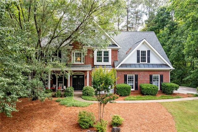 206 Kingsley Way, Woodstock, GA 30188 - view of front of home featuring brick siding, a shingled roof, and french doors