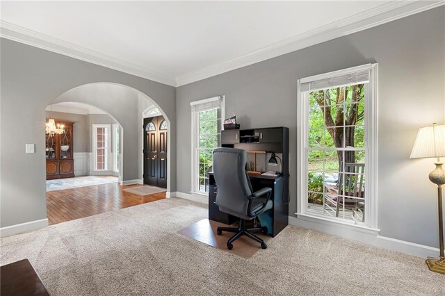 206 Kingsley Way, Woodstock, GA 30188 - office area featuring arched walkways, carpet floors, crown molding, baseboards, and a chandelier