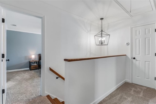 1123 Seaboard Ave NW, Atlanta, GA 30318 - hall featuring carpet flooring, an upstairs landing, attic access, and a notable chandelier
